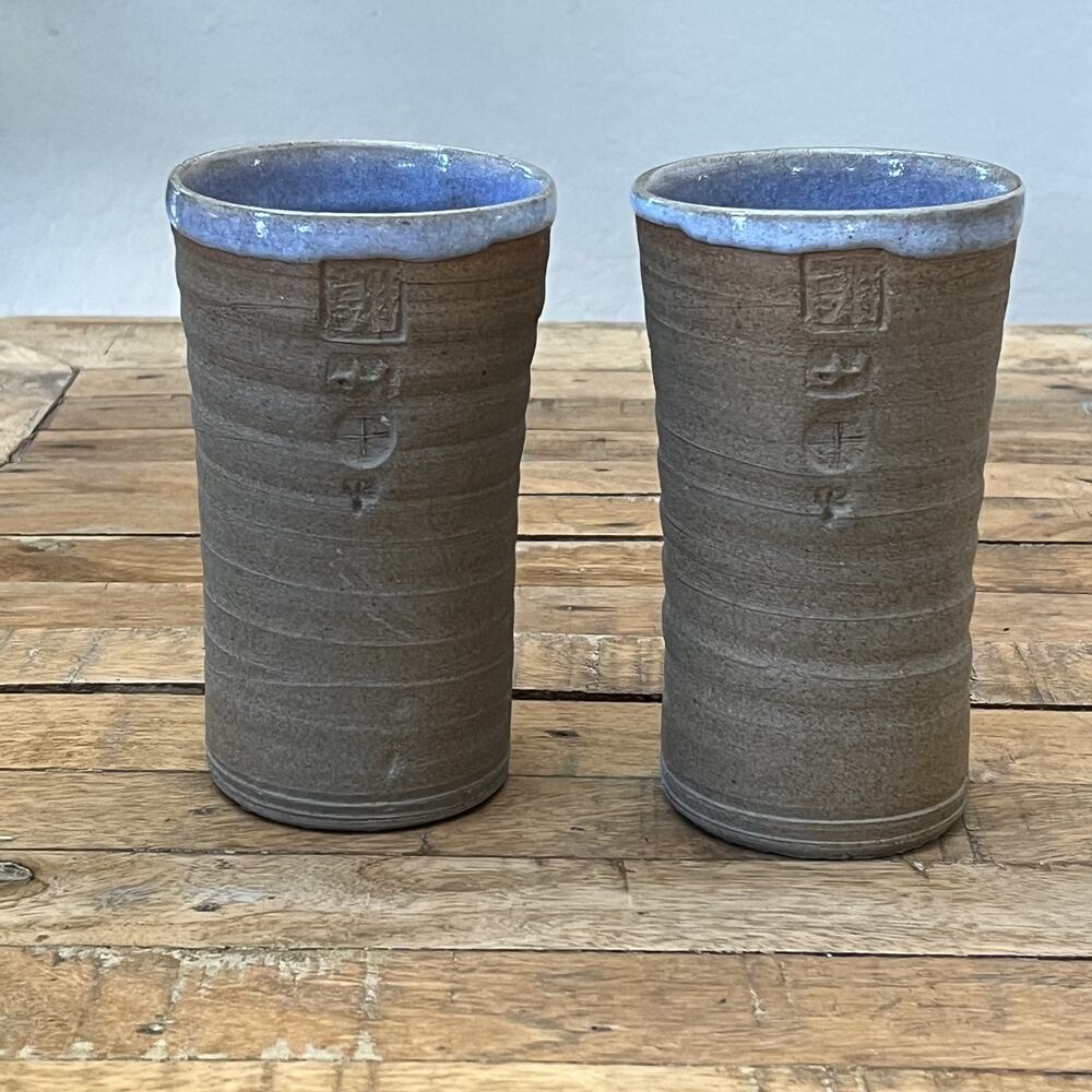 2 Art Studio Pottery Stoneware Tumbler Cups 6" Stamped Design Brown Blue Rim